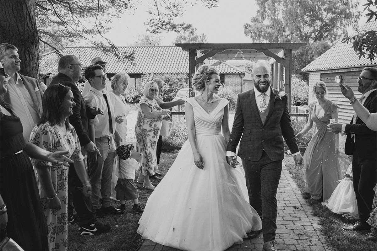 couple walking down aisle