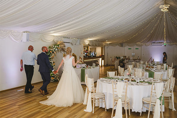 wedding reception room with couple