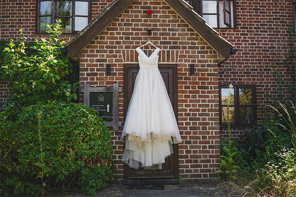 wedding gown hanging up